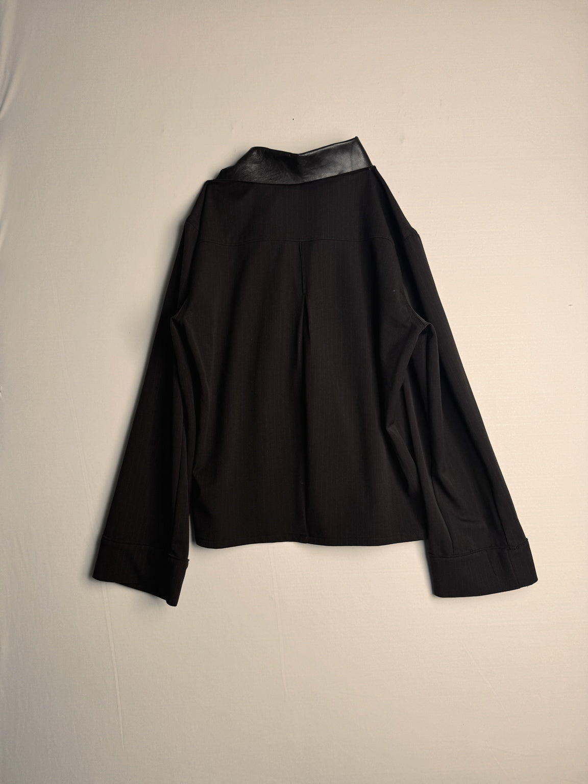 ASYMMETRICAL BUTTON UP