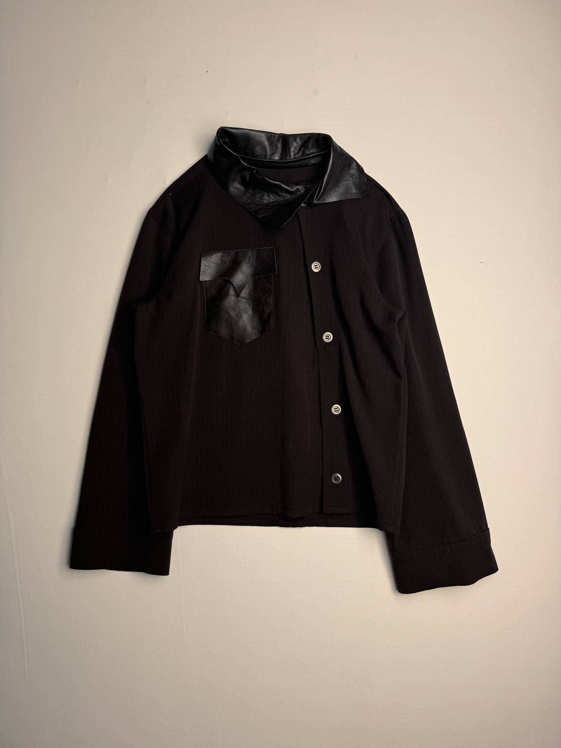ASYMMETRICAL BUTTON UP