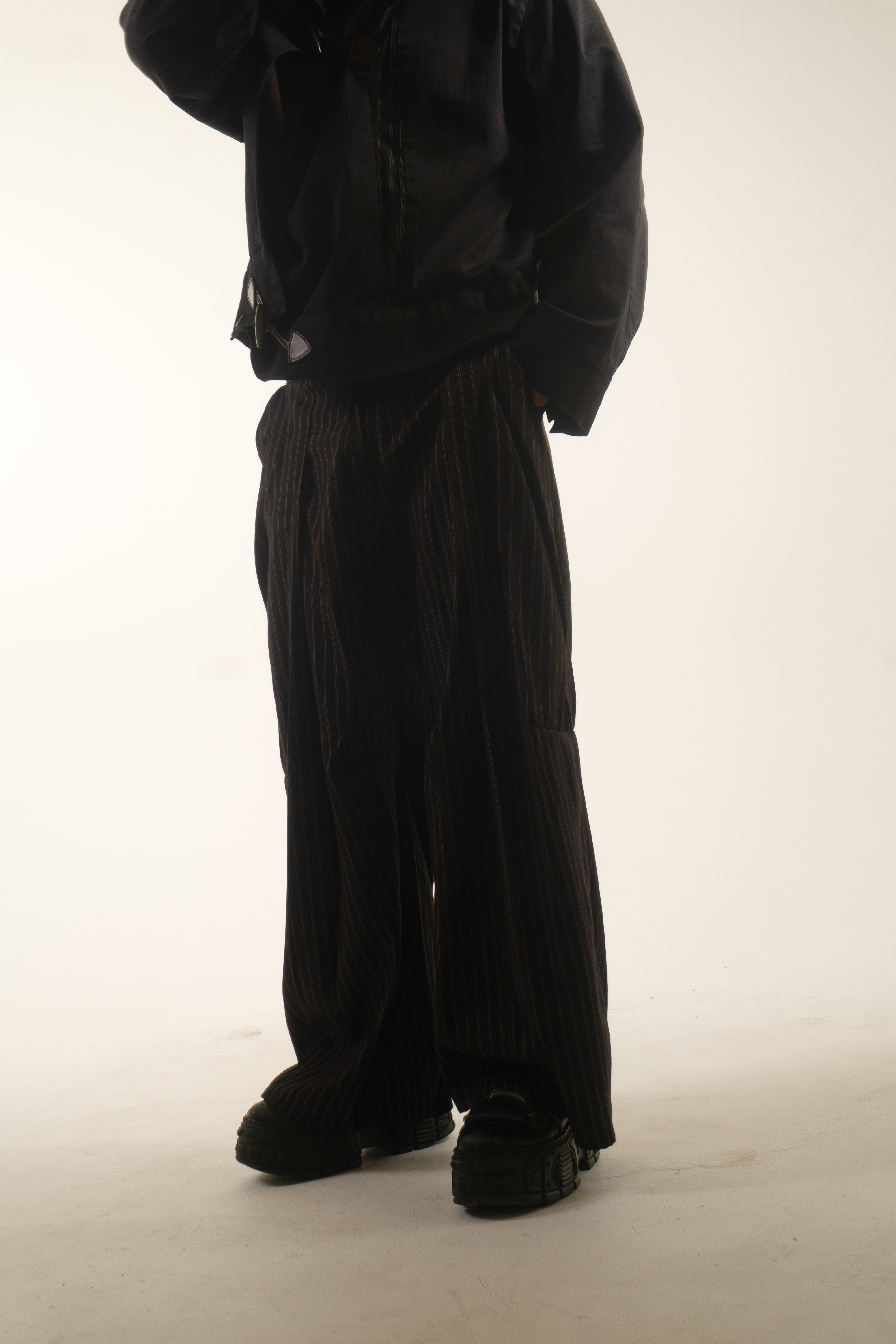 LOOK 1 PLEATED PINSTRIPE TROUSERS