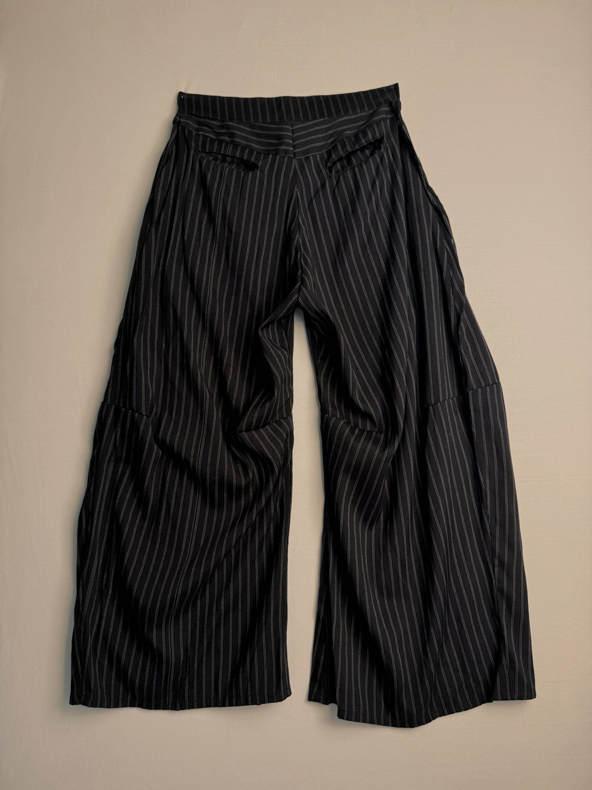 PLEATED PINSTRIPE TROUSERS